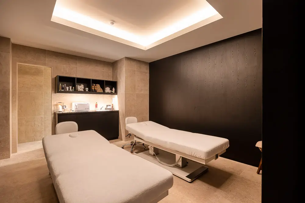 Luxury spa room with premium treatment tables and modern equipment.