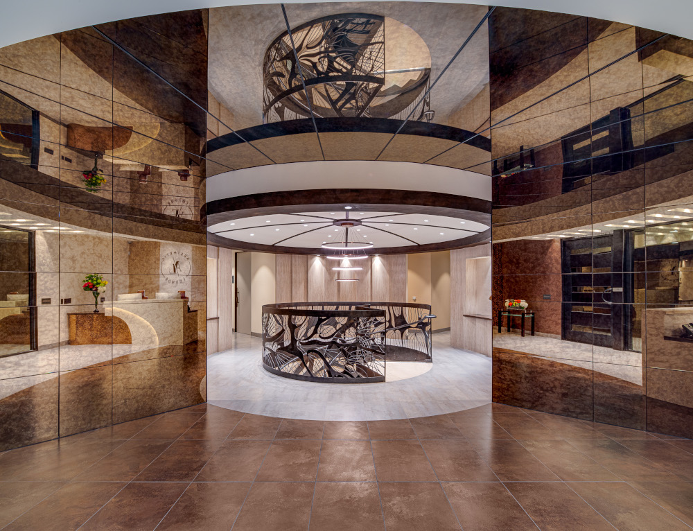Luxurious spa lobby with elegant design and premium treatment tables at Gharieni.