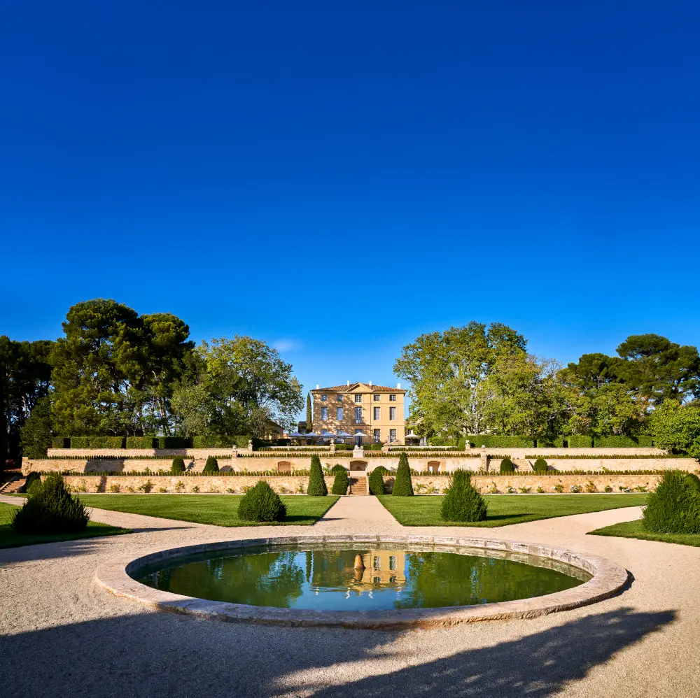 Luxurious spa setting with elegant architecture and serene garden design.